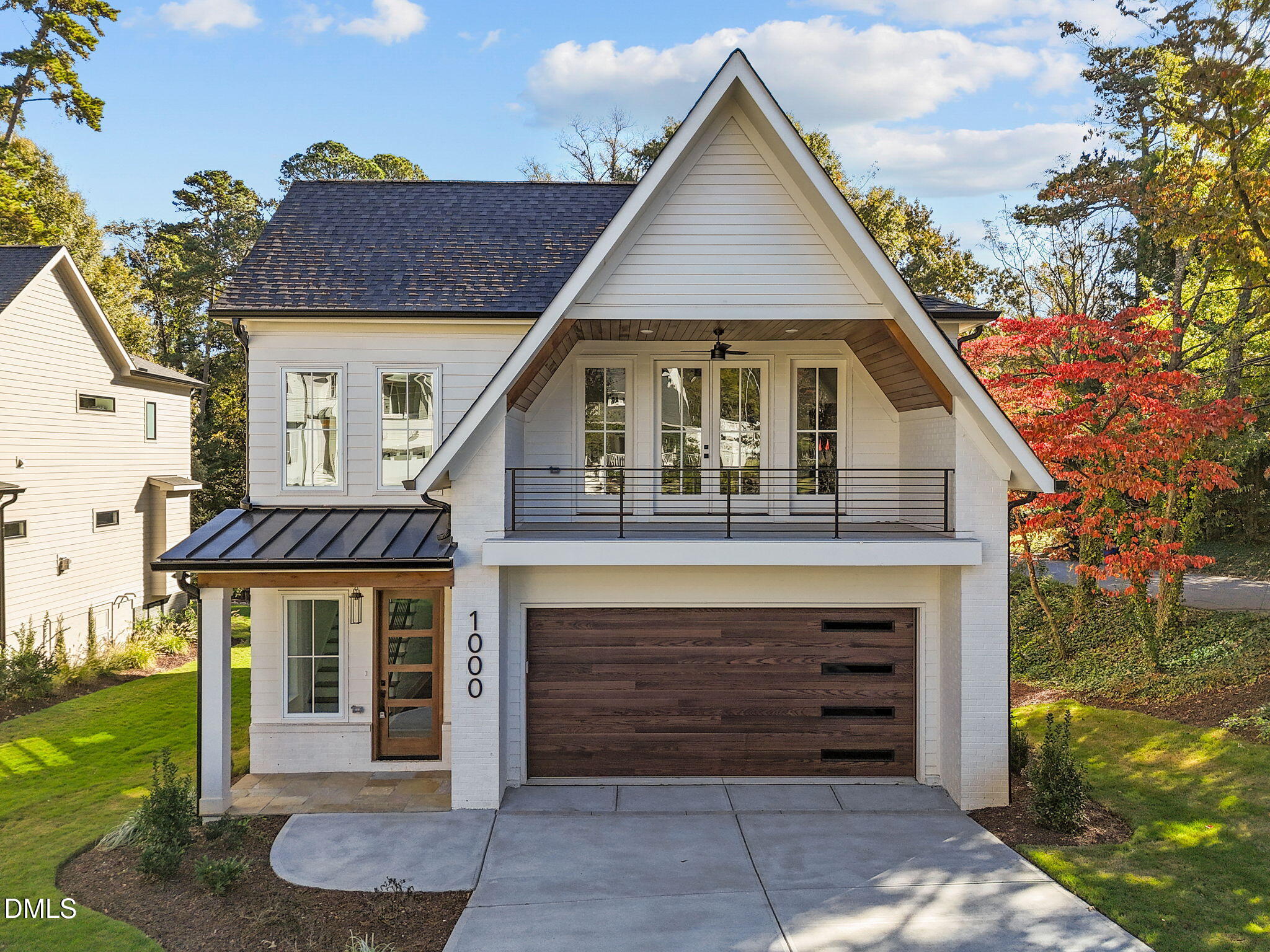 1000 Canterbury Road Raleigh, NC 27607 - Photo 1 of 46 a front view of a house with a garden