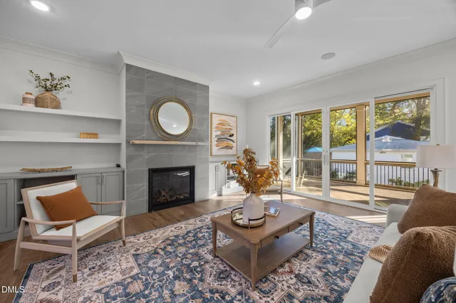 a living room with furniture or couch and a large window