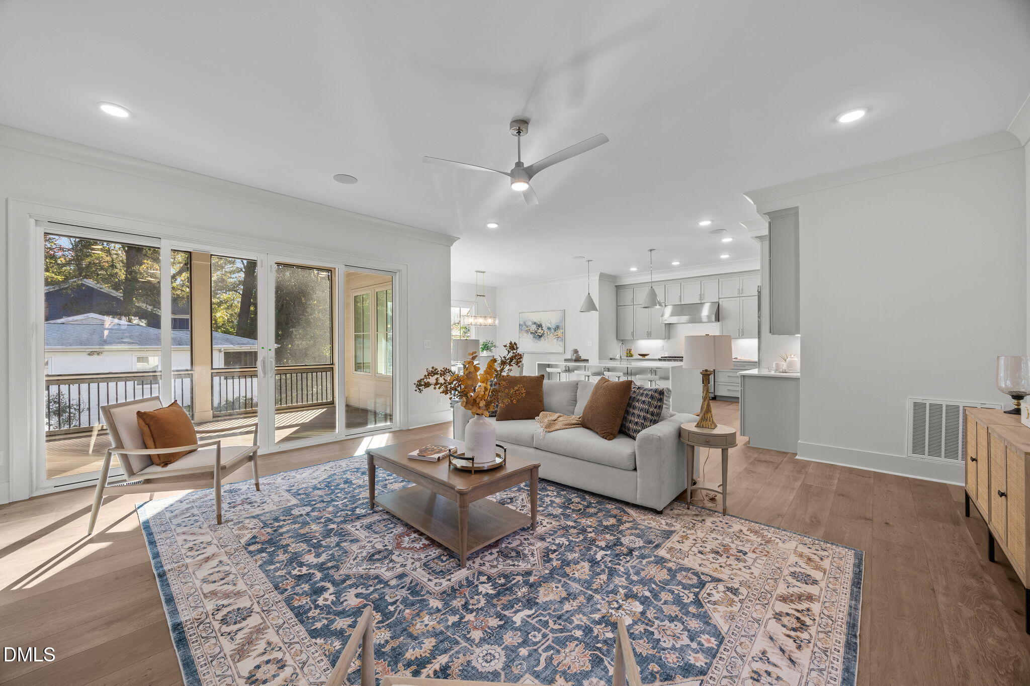 1000 Canterbury Road Raleigh, NC 27607 - Photo 14 of 46 a living room with furniture or couch and a large window