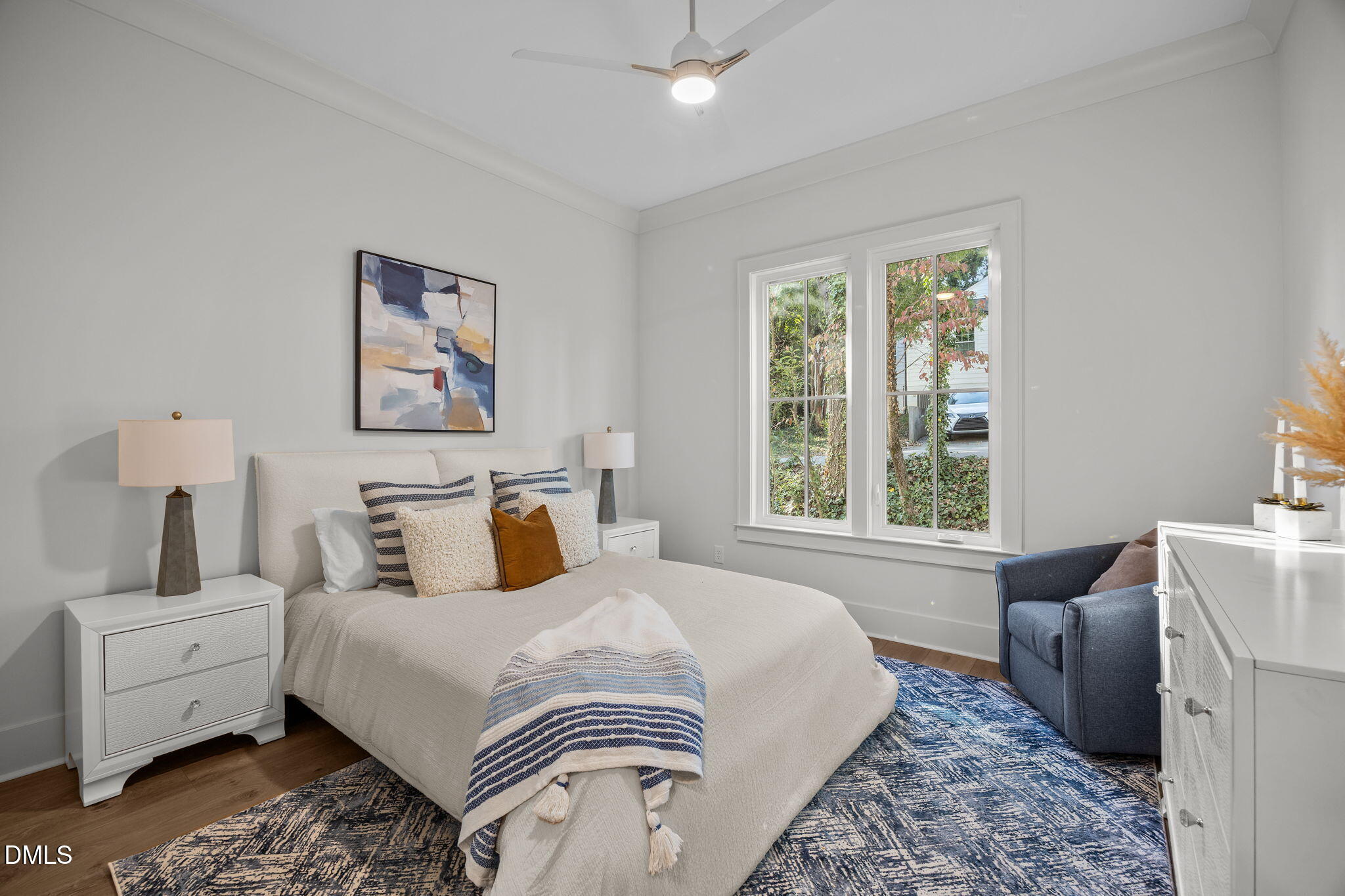1000 Canterbury Road Raleigh, NC 27607 - Photo 19 of 46 a bedroom with a bed and a couch