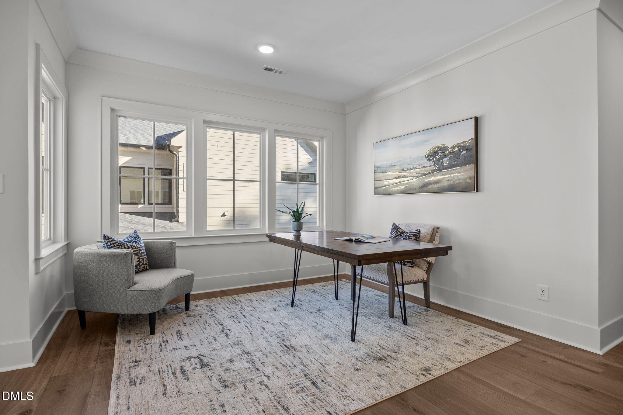 1000 Canterbury Road Raleigh, NC 27607 - Photo 23 of 46 a living room with furniture and a window