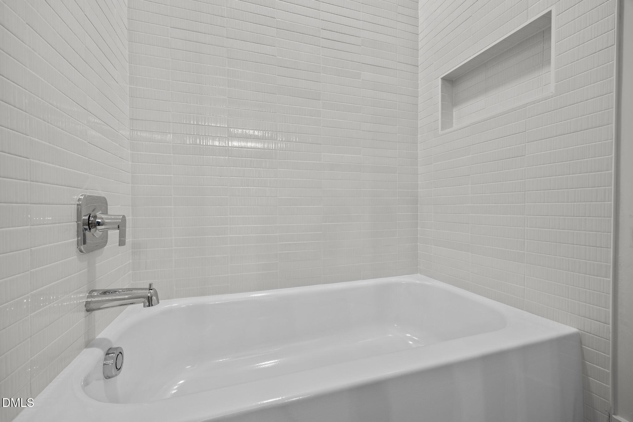 1000 Canterbury Road Raleigh, NC 27607 - Photo 27 of 46 a close up of a bathtub