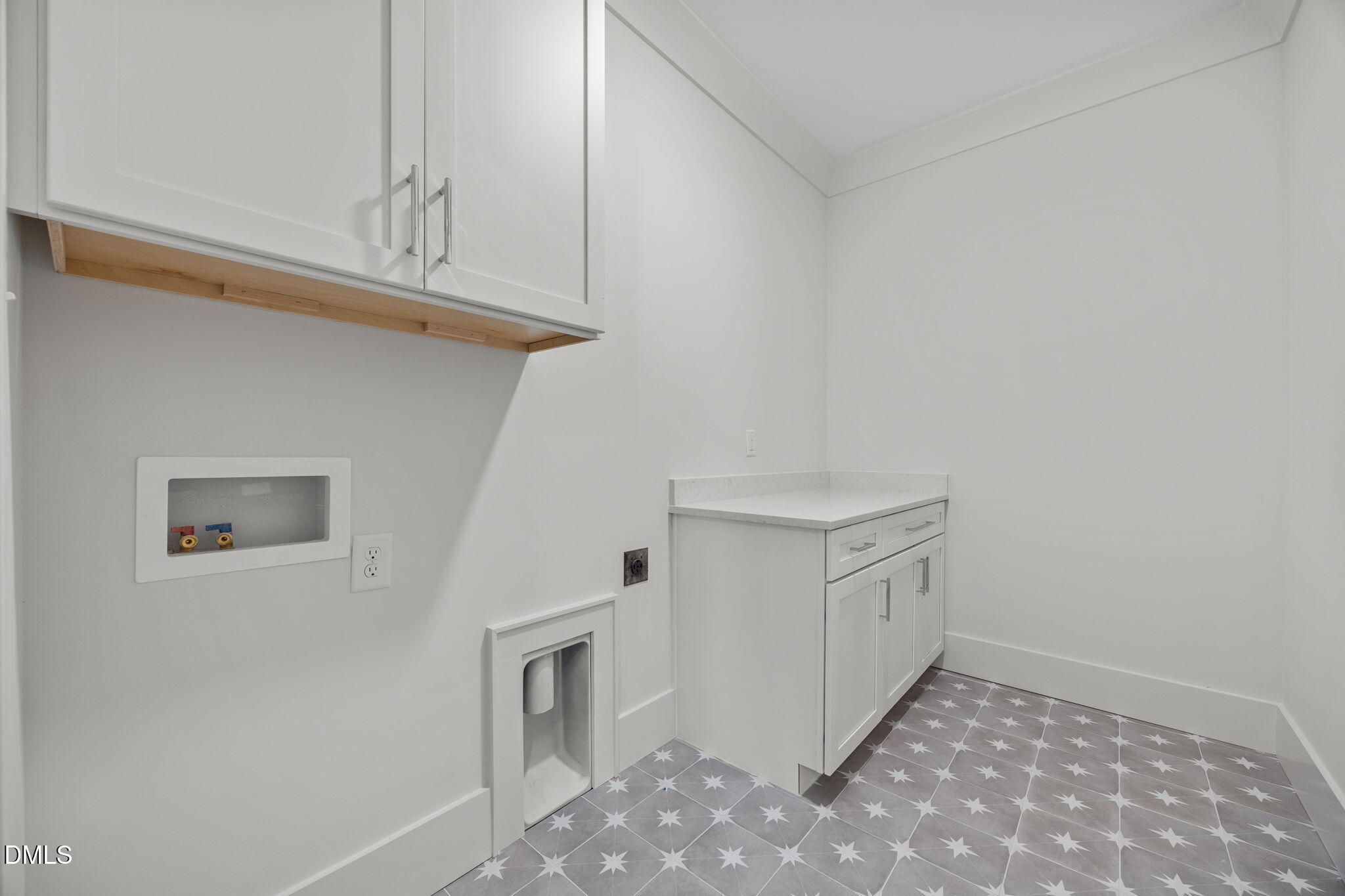 1000 Canterbury Road Raleigh, NC 27607 - Photo 38 of 46 a view of a hallway with washer and dryer