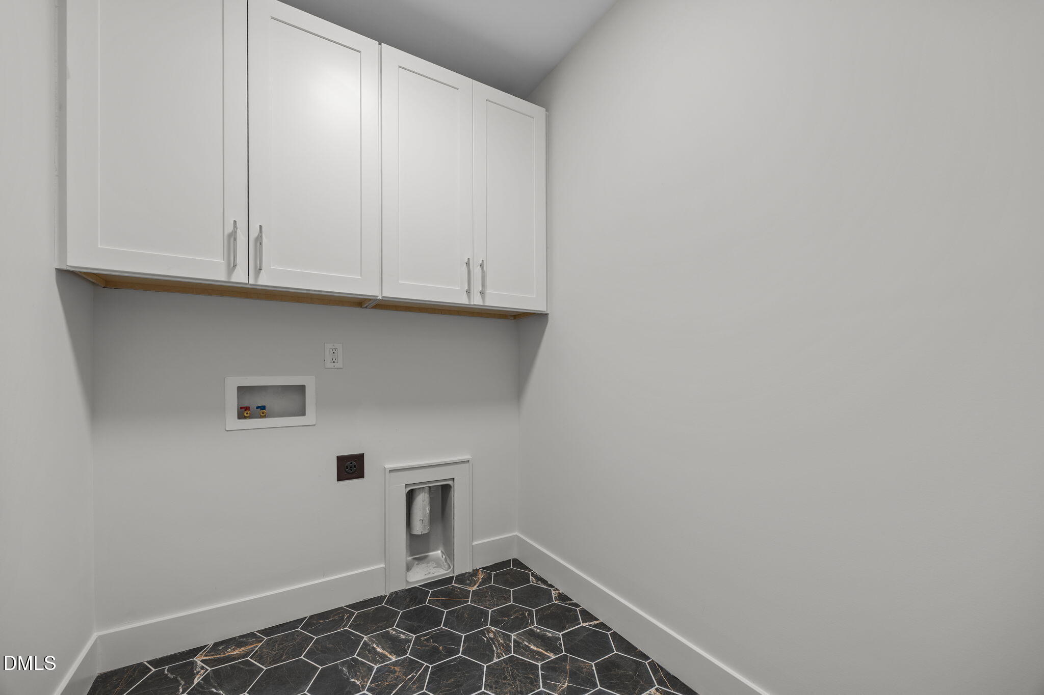 1000 Canterbury Road Raleigh, NC 27607 - Photo 39 of 46 a view of storage and utility room with empty racks