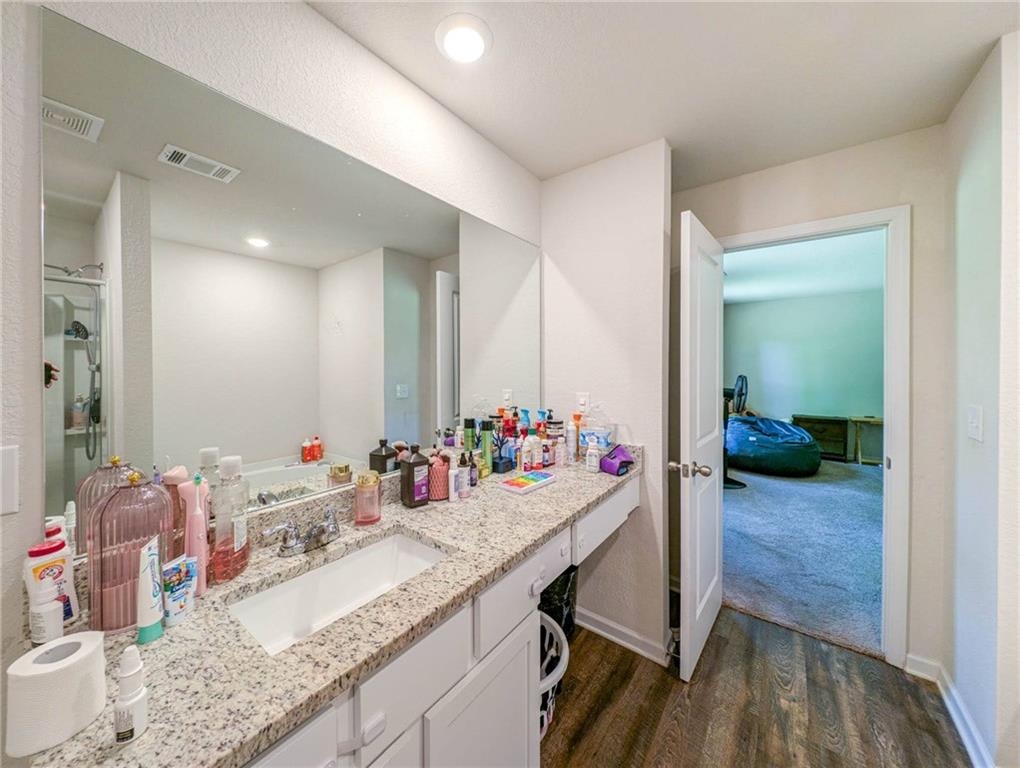635 Meadows Farm Way Monroe, GA 30655 - Photo 25 of 36 a view of a kitchen and sink wooden floor