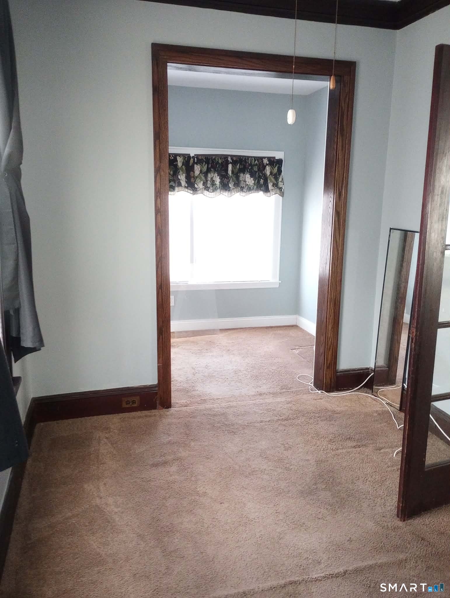 64 Moody Avenue Fairfield, CT 06825 - Photo 13 of 38 a view of an empty room and a window