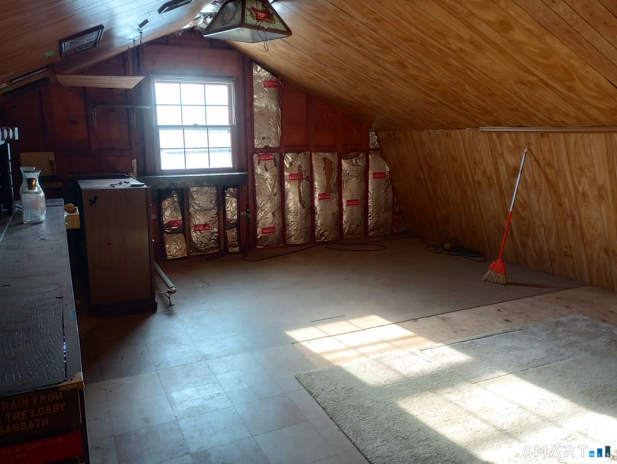 64 Moody Avenue Fairfield, CT 06825 - Photo 30 of 38 an empty room with windows