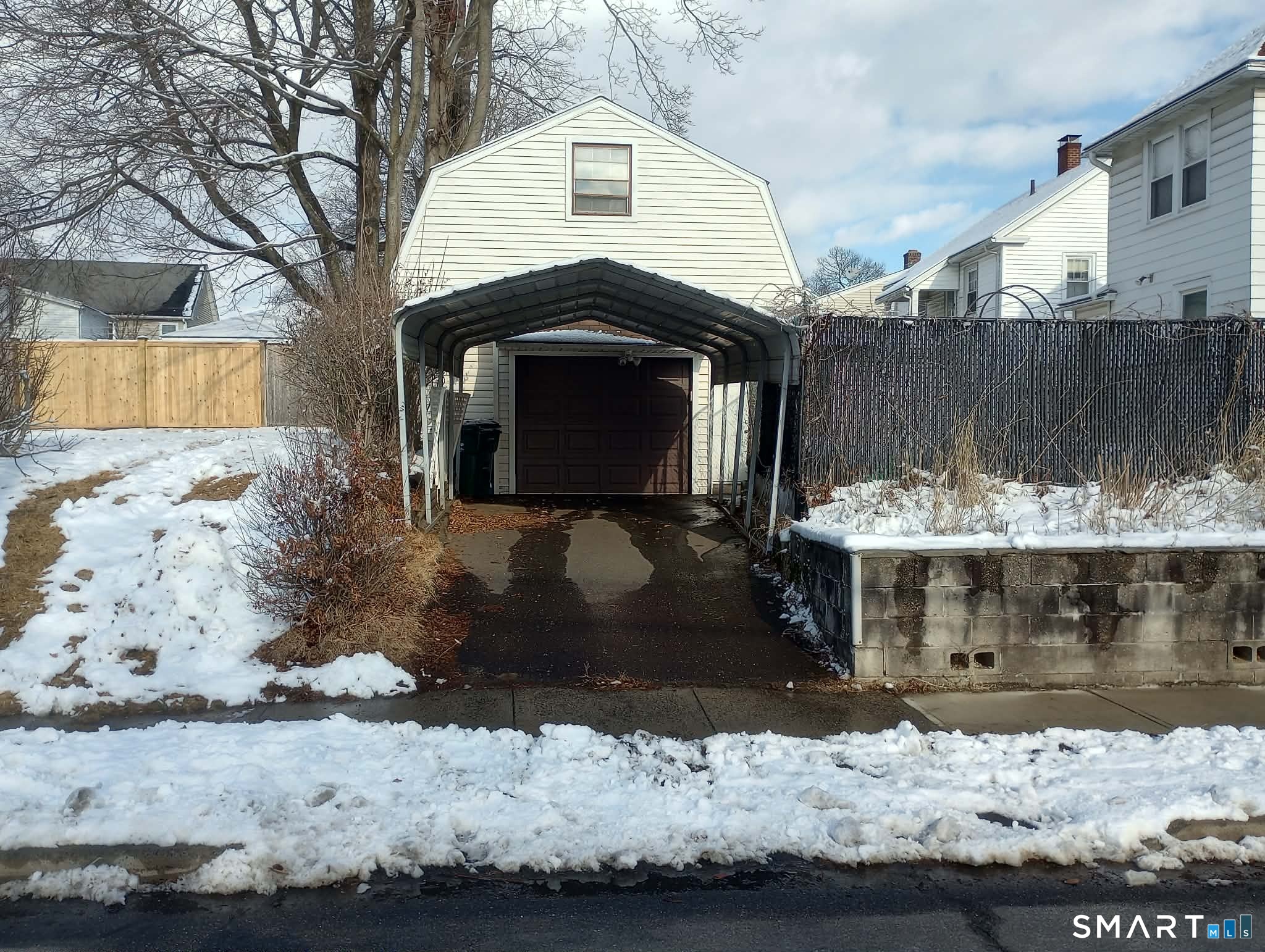 64 Moody Avenue Fairfield, CT 06825 - Photo 37 of 38 a front view of a house with a yard