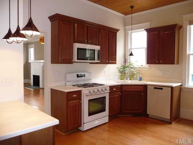 625 East Franklin Street Raleigh, NC 27604 - Photo 5 of 25 With plenty of handsome cabinets and solid surface countertops, this is not your great grandmothers 1930s kitchen.