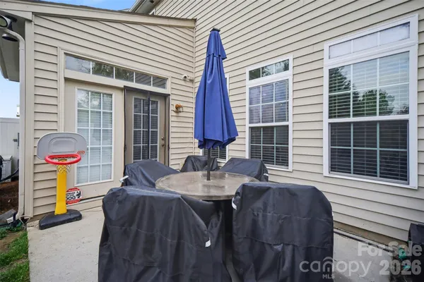 a front view of a house with patio