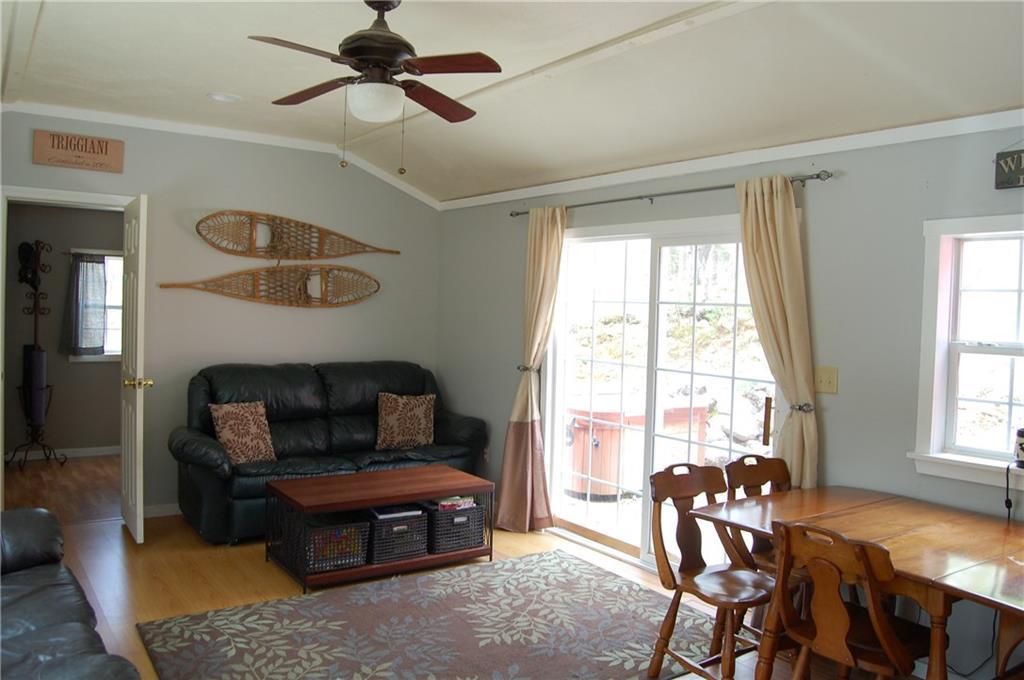 36 Roz Lane Denmark, ME 04022 - Photo 8 of 24 Living room/dining area.