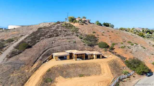 a view of a house with a mountain