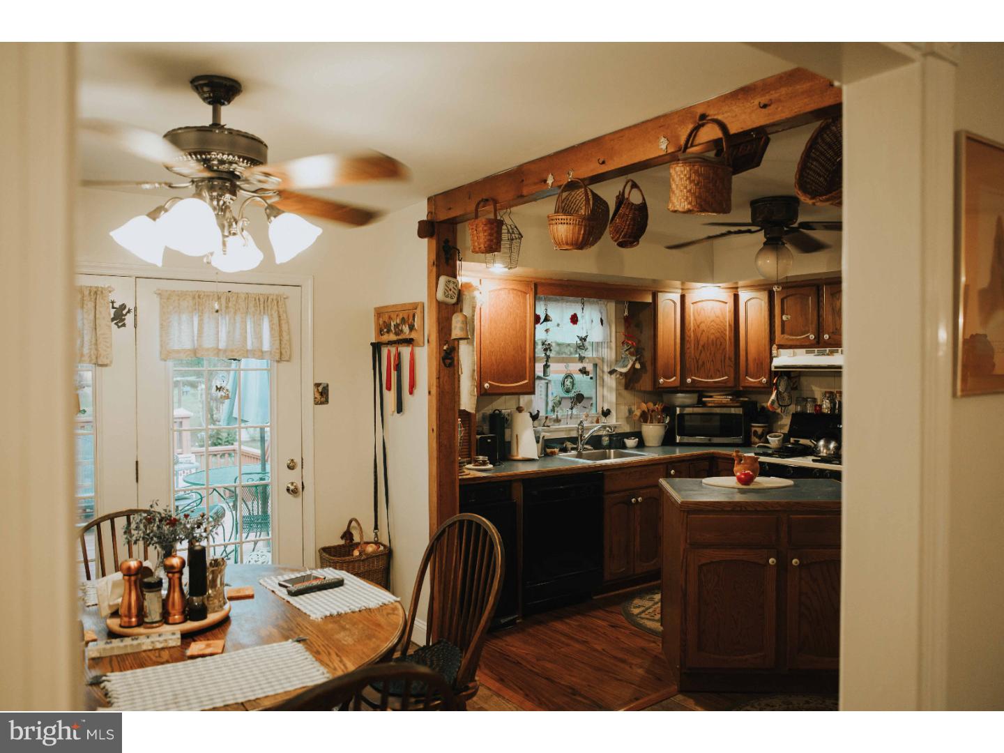 153 Silver Springs Road Phoenixville, PA 19460 - Photo 8 of 15 Kitchen/Dining area with door to deck
