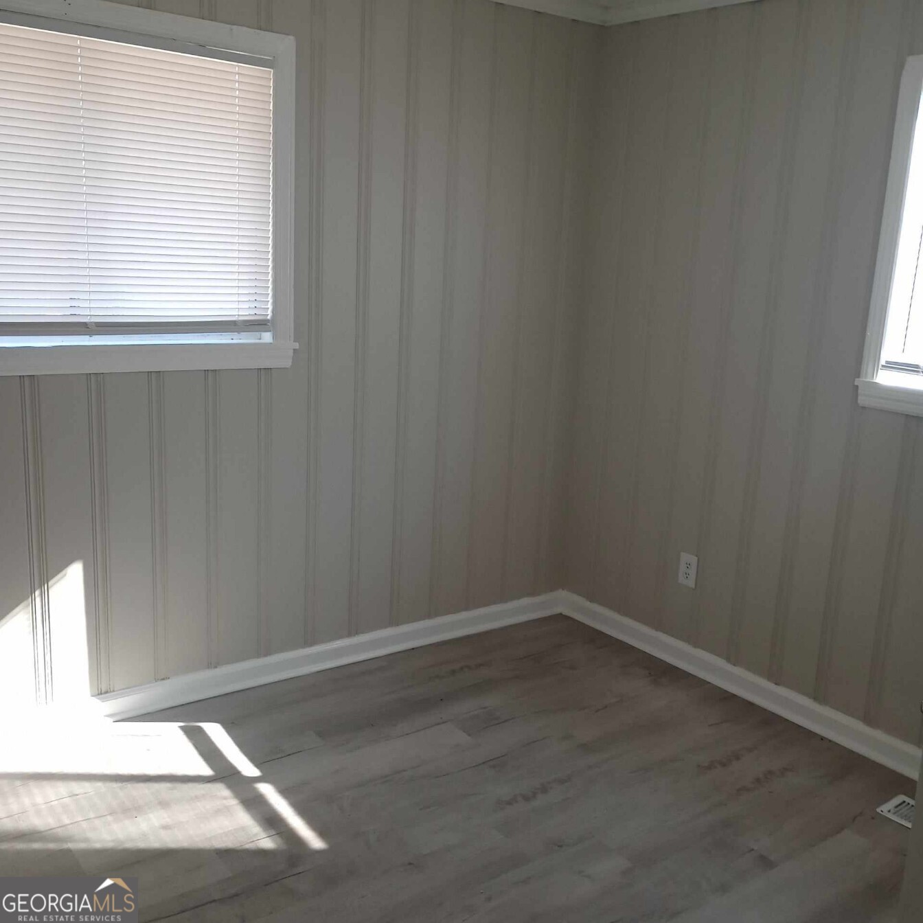 193 Frazier Drive Southeast Milledgeville, GA 31061 - Photo 33 of 38 a view of a small space with wooden floor and a window