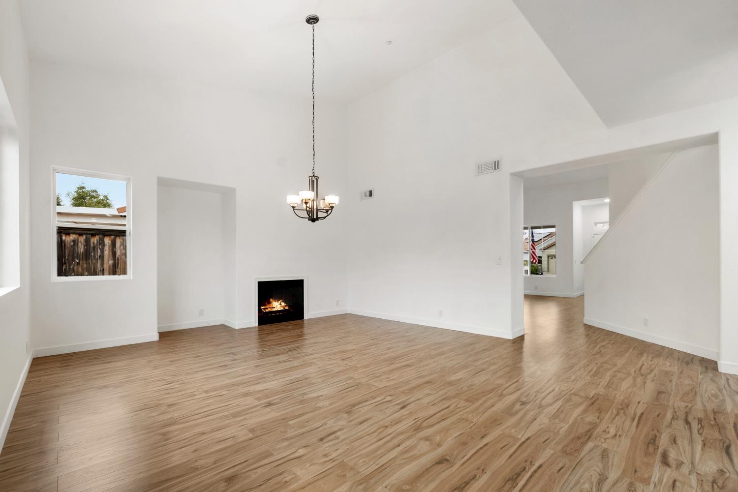 624 Snapdragon Street Winters, CA 95694 - Photo 12 of 65 a view of empty room with wooden floor