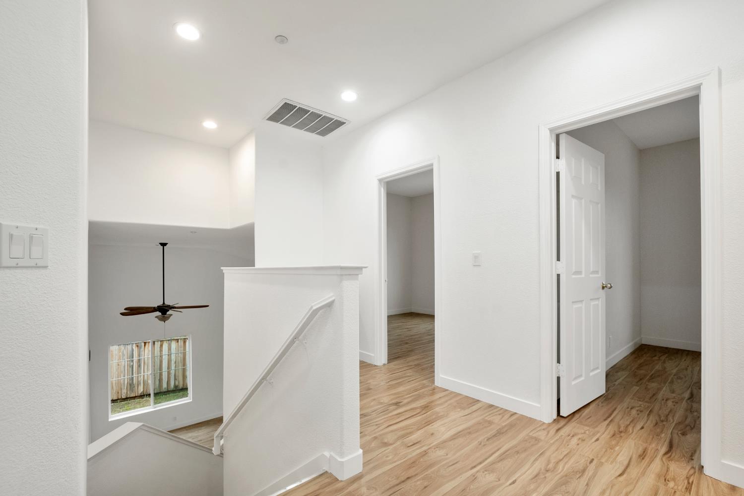 624 Snapdragon Street Winters, CA 95694 - Photo 27 of 65 a view of a hallway with wooden floor and entryway