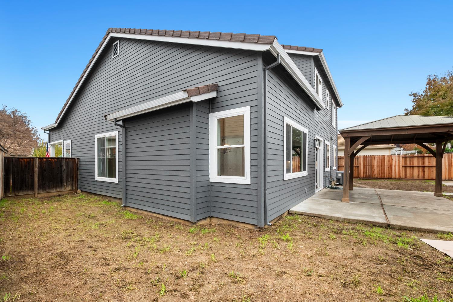 624 Snapdragon Street Winters, CA 95694 - Photo 46 of 65 a front view of a house with garden