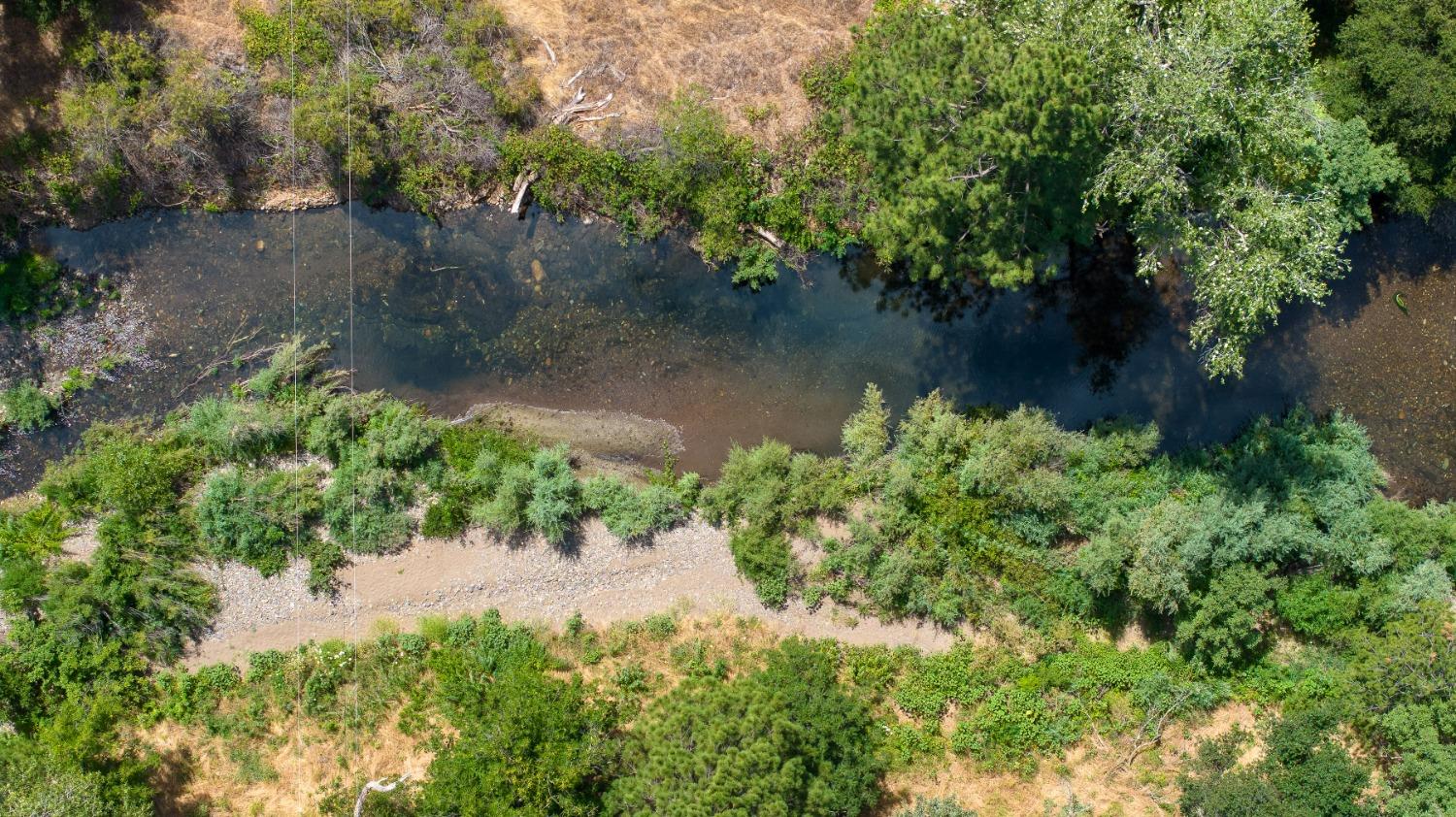 0 Sutter Creek Road Sutter Creek, CA 95685 - Photo 2 of 23 a view of a lake with a yard