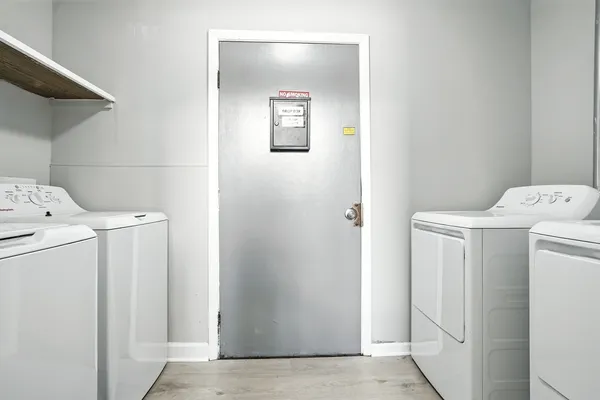 a view of a bathroom with a glass door