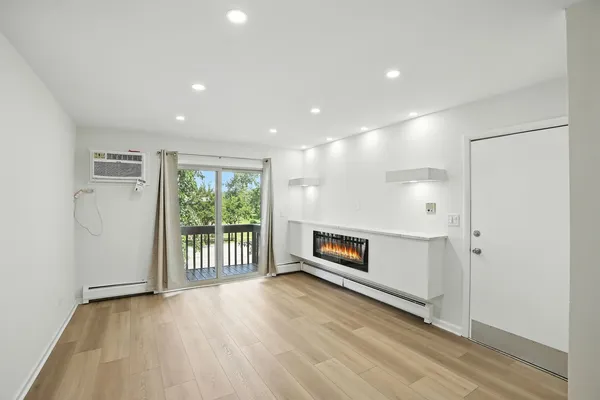 a view of a livingroom with a fireplace