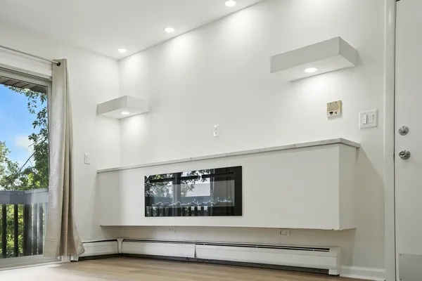 a view of a hallway with entryway