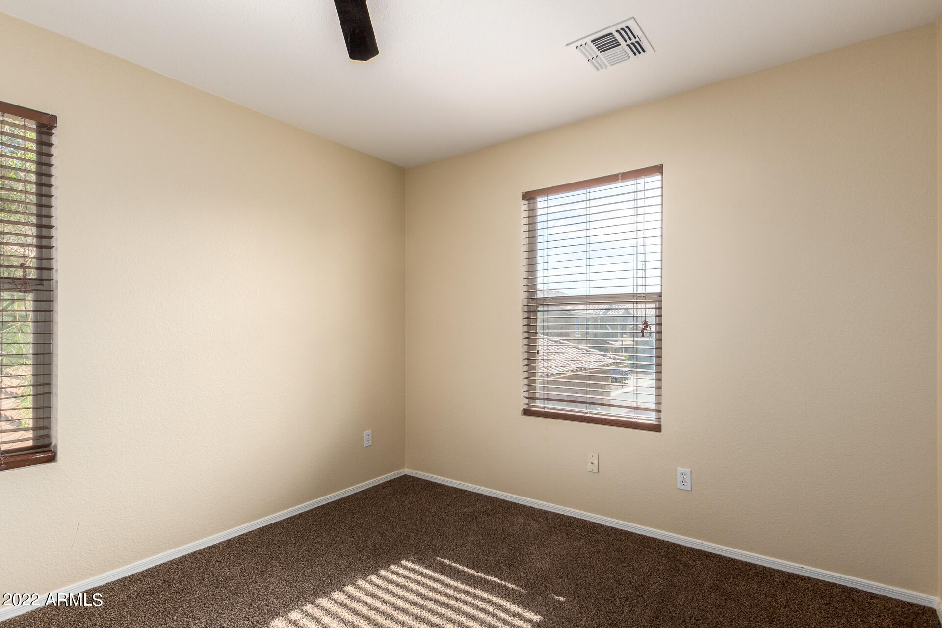 9373 West Eaton Road Phoenix, AZ 85037 - Photo 15 of 19 a view of an empty room with a window