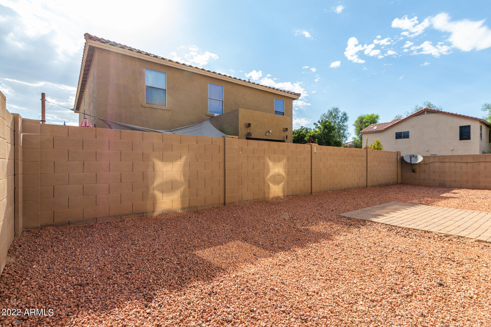 9373 West Eaton Road Phoenix, AZ 85037 - Photo 18 of 19 a backyard of a house