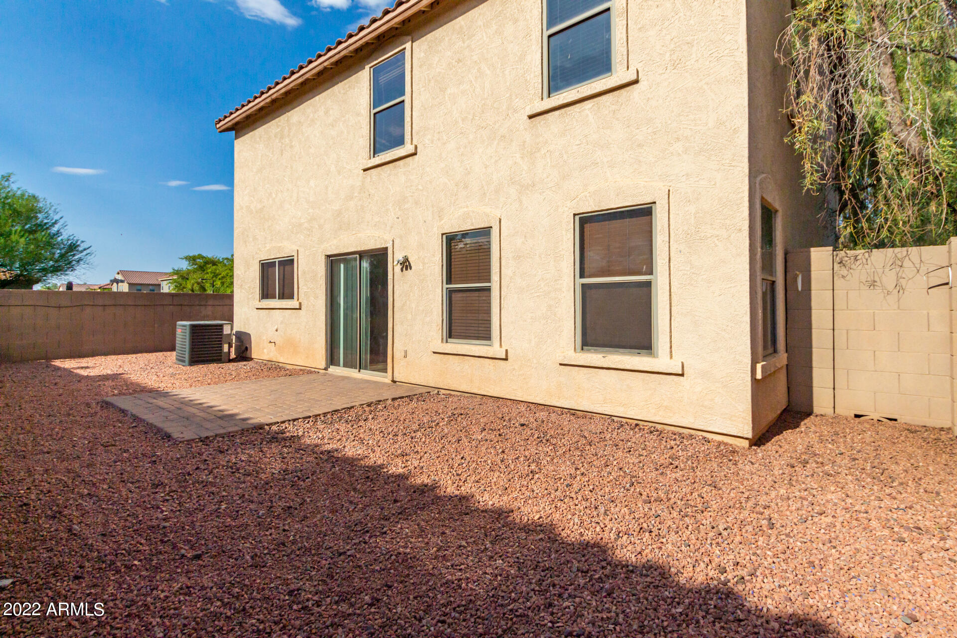 9373 West Eaton Road Phoenix, AZ 85037 - Photo 19 of 19 a house view with a backyard