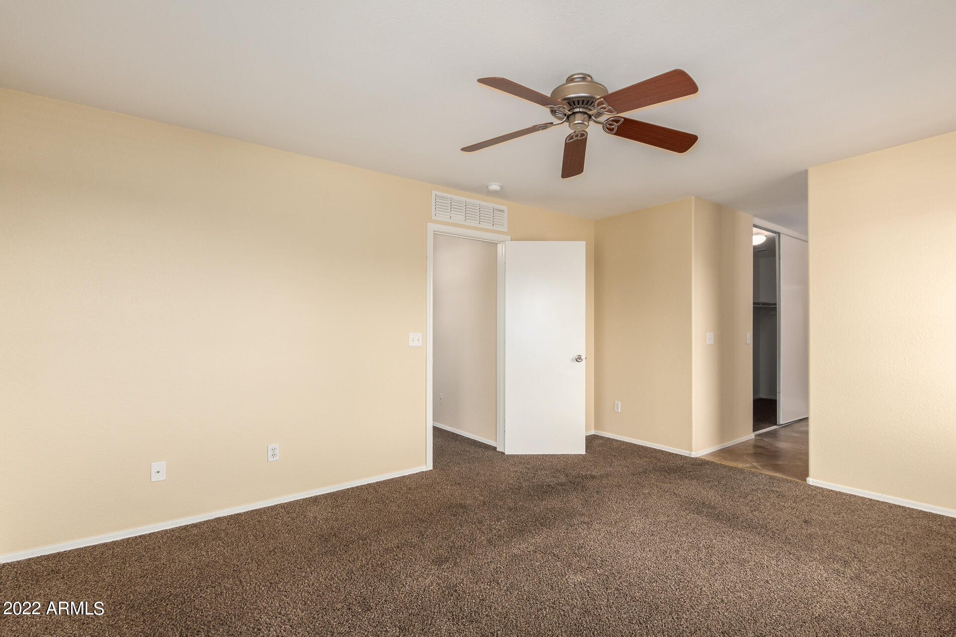 9373 West Eaton Road Phoenix, AZ 85037 - Photo 9 of 19 a view of an empty room