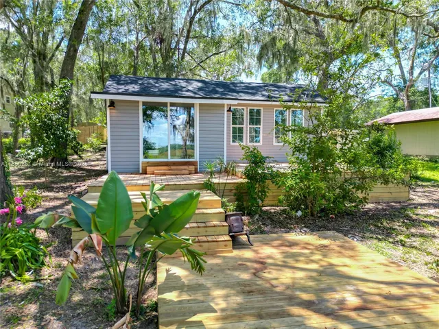 a house view with a garden space