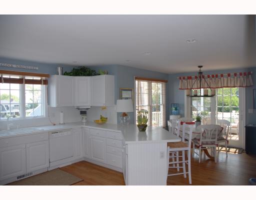 66 Prospect Farm Road Portsmouth, RI 02871 - Photo 7 of 8 Kitchen. KITCHEN AND EATING AREA OVERLOOKING THE DECK AND BACKYARD