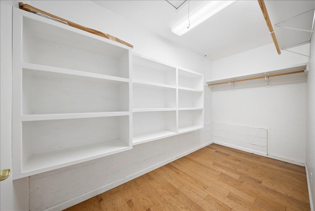 27769 Table Meadow Road Auburn, CA 95602 - Photo 20 of 43 a view of an empty room with a window and wooden floor