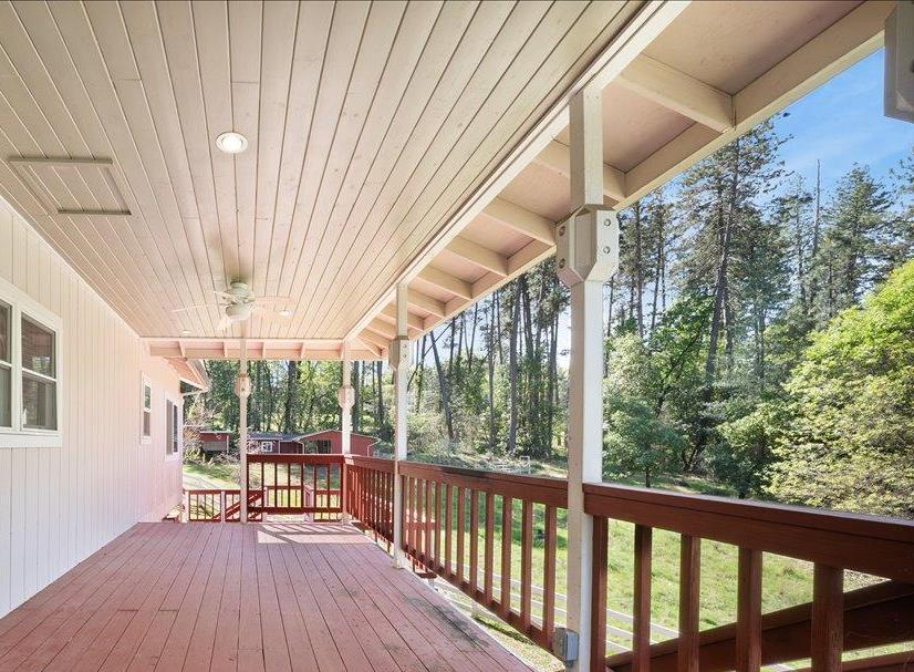 27769 Table Meadow Road Auburn, CA 95602 - Photo 25 of 43 a balcony with wooden floor and outdoor space
