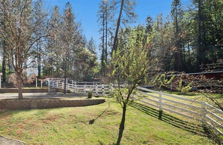 27769 Table Meadow Road Auburn, CA 95602 - Photo 26 of 43 a view of a yard with an outdoor space