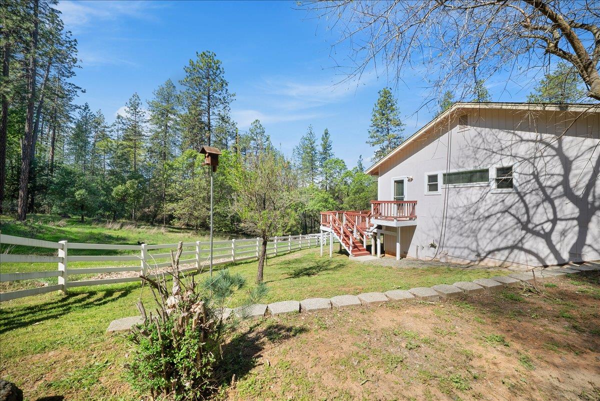27769 Table Meadow Road Auburn, CA 95602 - Photo 28 of 43 a view of a house with backyard and sitting area