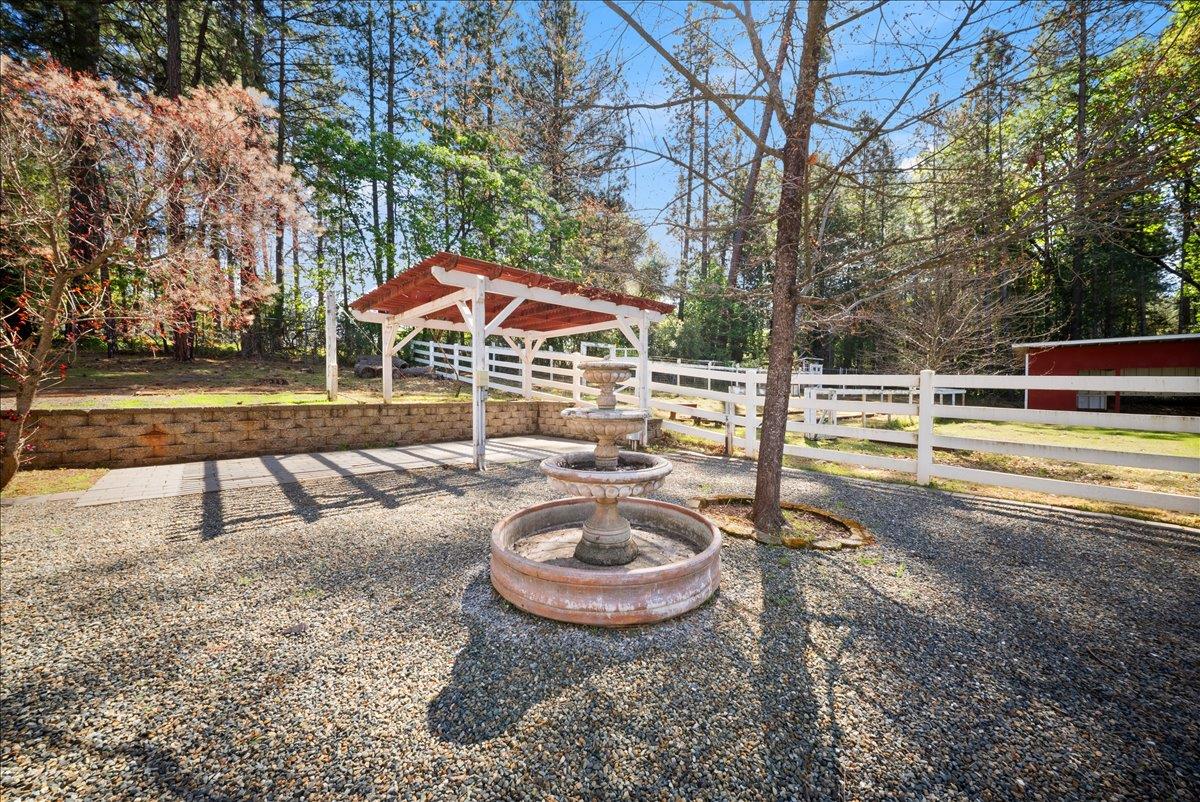 27769 Table Meadow Road Auburn, CA 95602 - Photo 30 of 43 a view of a swimming pool with a patio