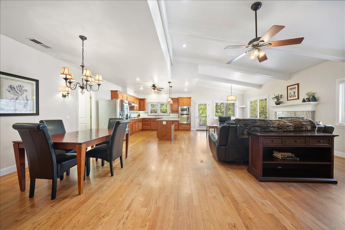 27769 Table Meadow Road Auburn, CA 95602 - Photo 6 of 43 a view of a dining room with furniture and wooden floor