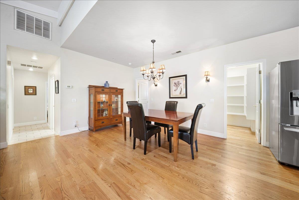 27769 Table Meadow Road Auburn, CA 95602 - Photo 8 of 43 a view of a dining room with furniture and wooden floor