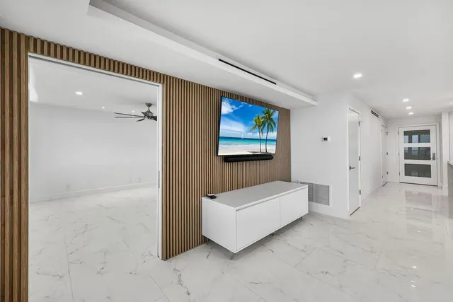 a spacious bathroom with a bathtub and a shower
