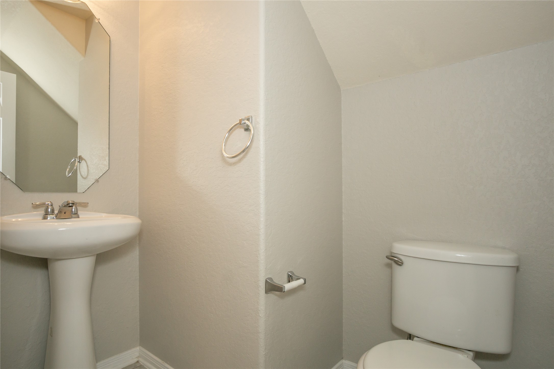 2535 Elm Crossing Trail Spring, TX 77386 - Photo 13 of 33 a bathroom with a sink mirror and toilet