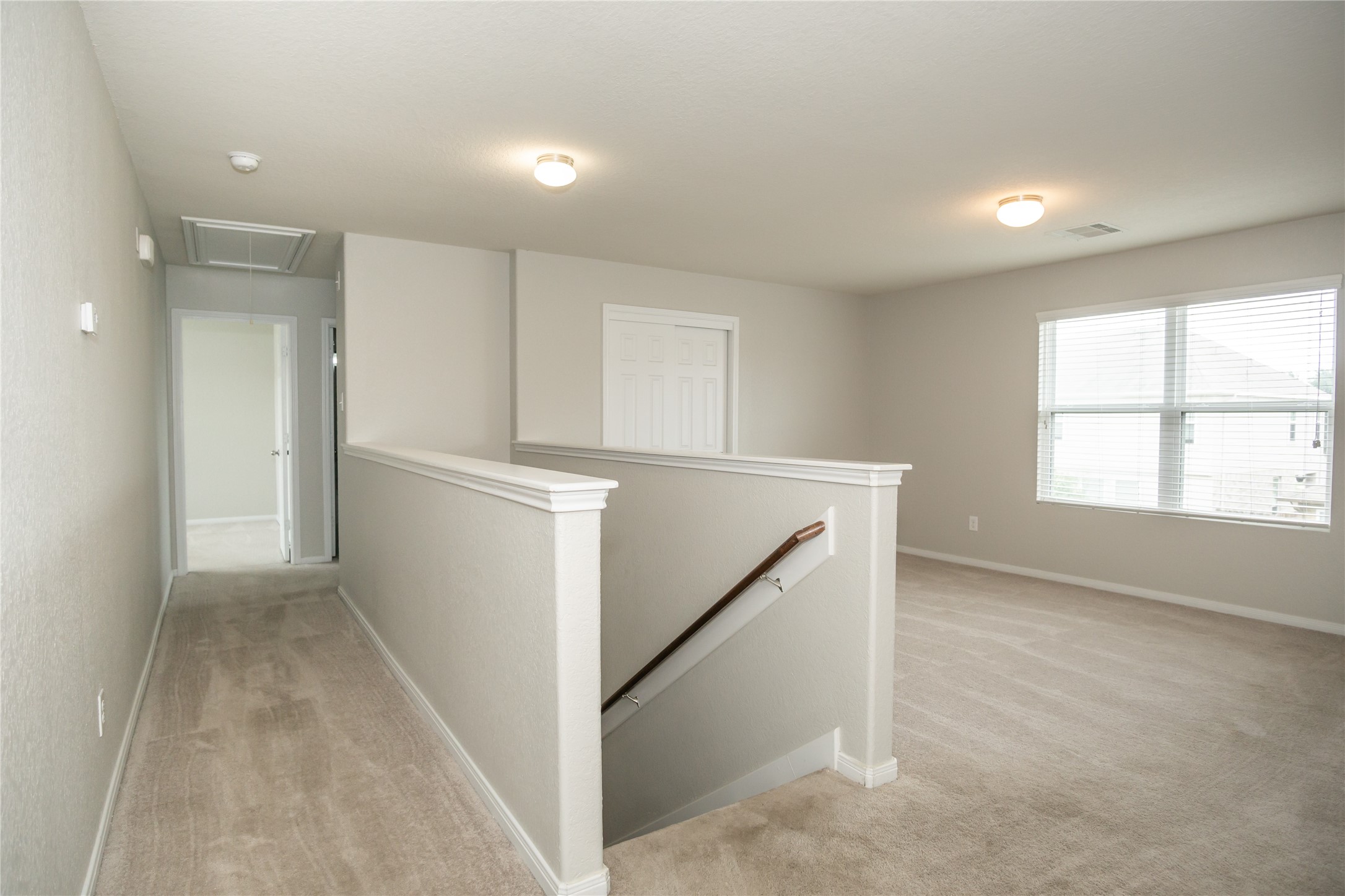2535 Elm Crossing Trail Spring, TX 77386 - Photo 14 of 33 an empty room with windows and closet