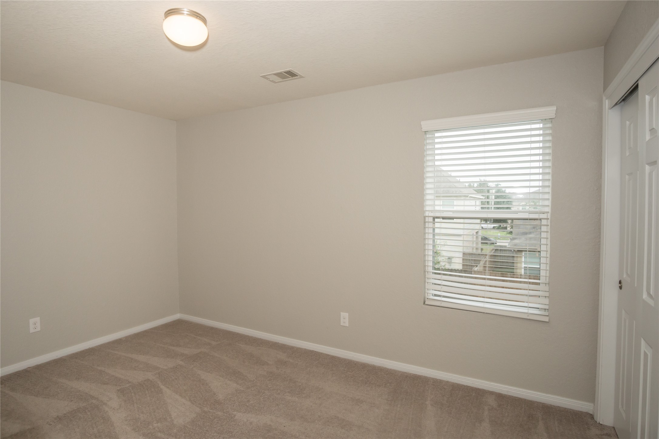 2535 Elm Crossing Trail Spring, TX 77386 - Photo 22 of 33 an empty room with a window