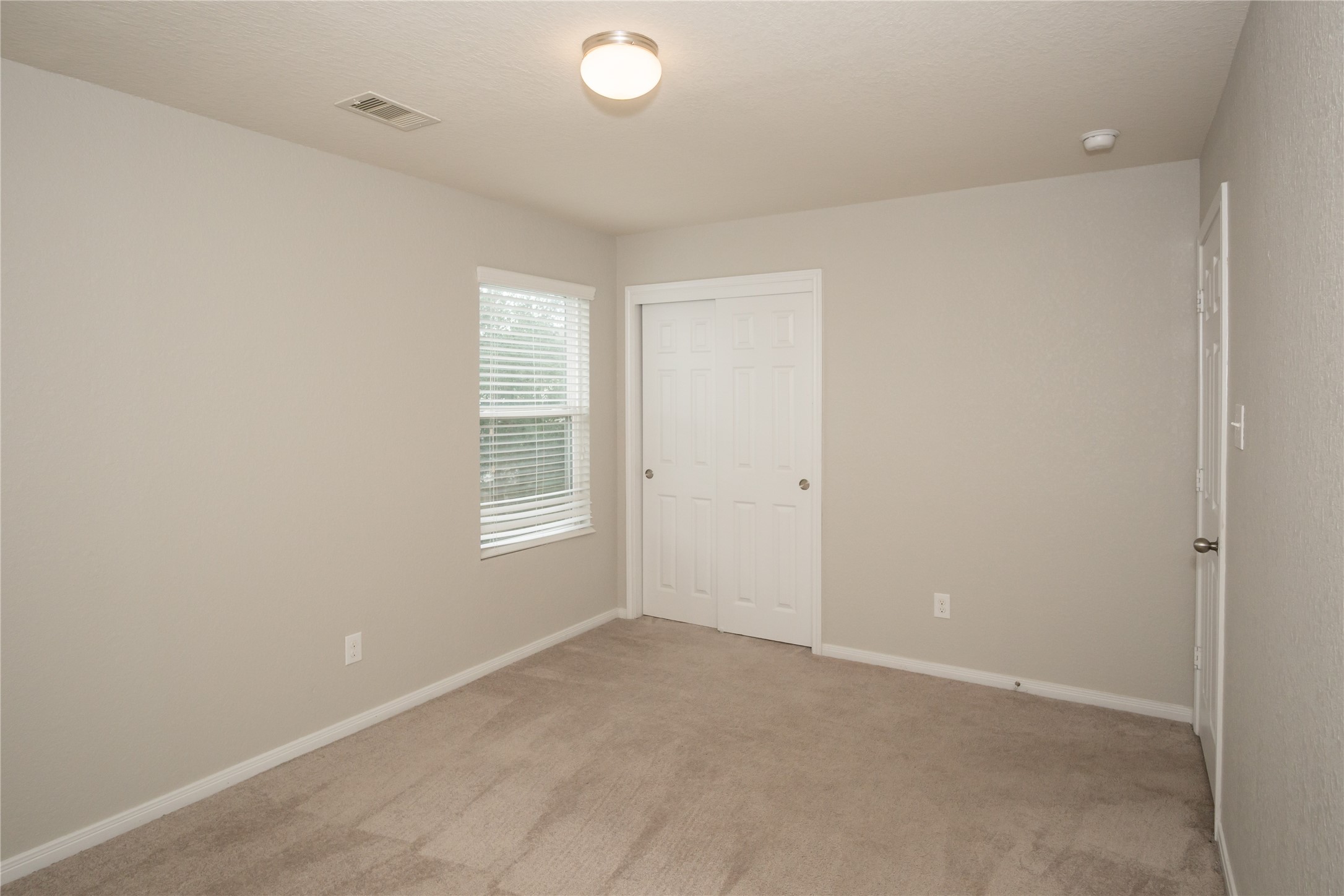2535 Elm Crossing Trail Spring, TX 77386 - Photo 23 of 33 an empty room with windows