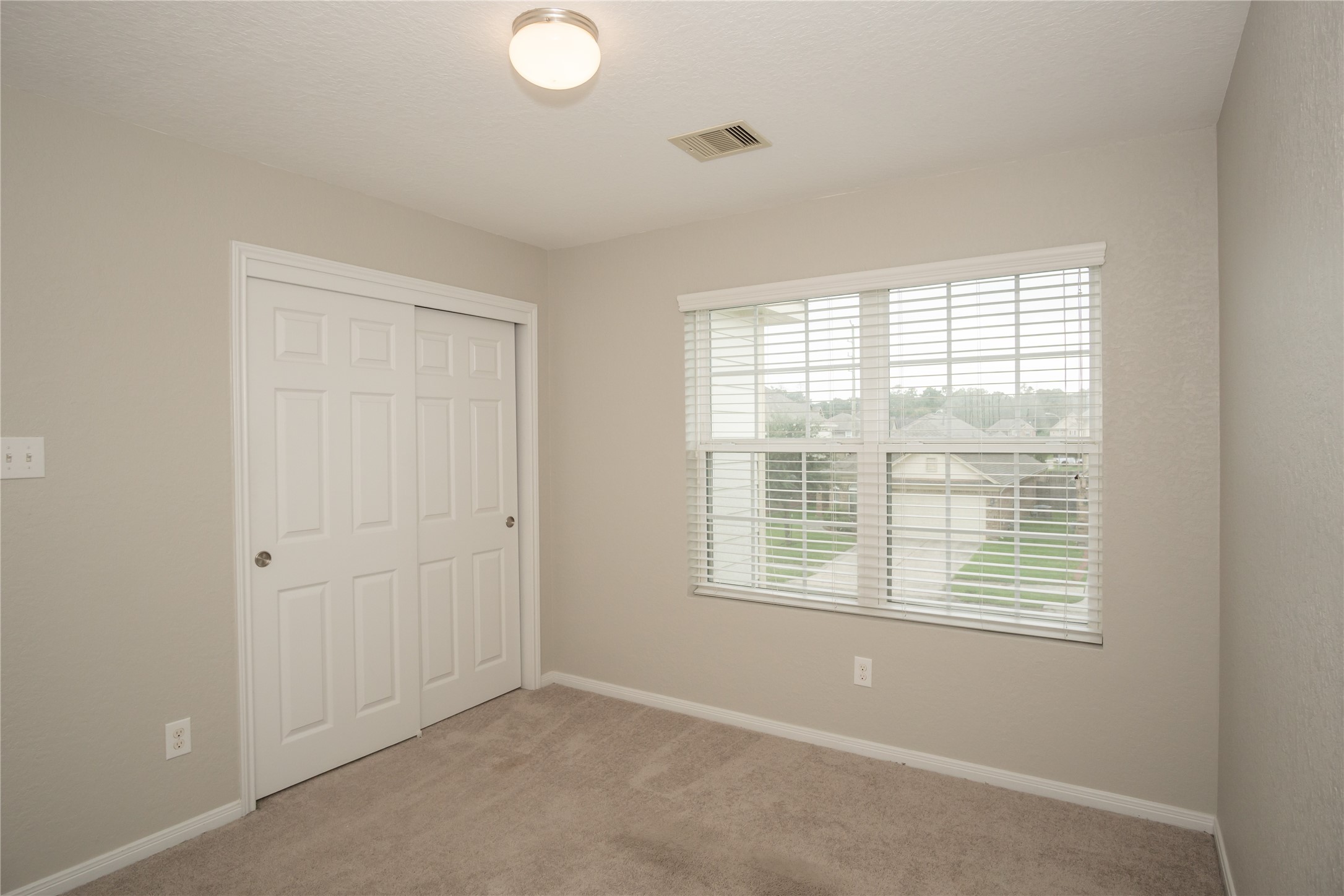 2535 Elm Crossing Trail Spring, TX 77386 - Photo 25 of 33 an empty room with windows