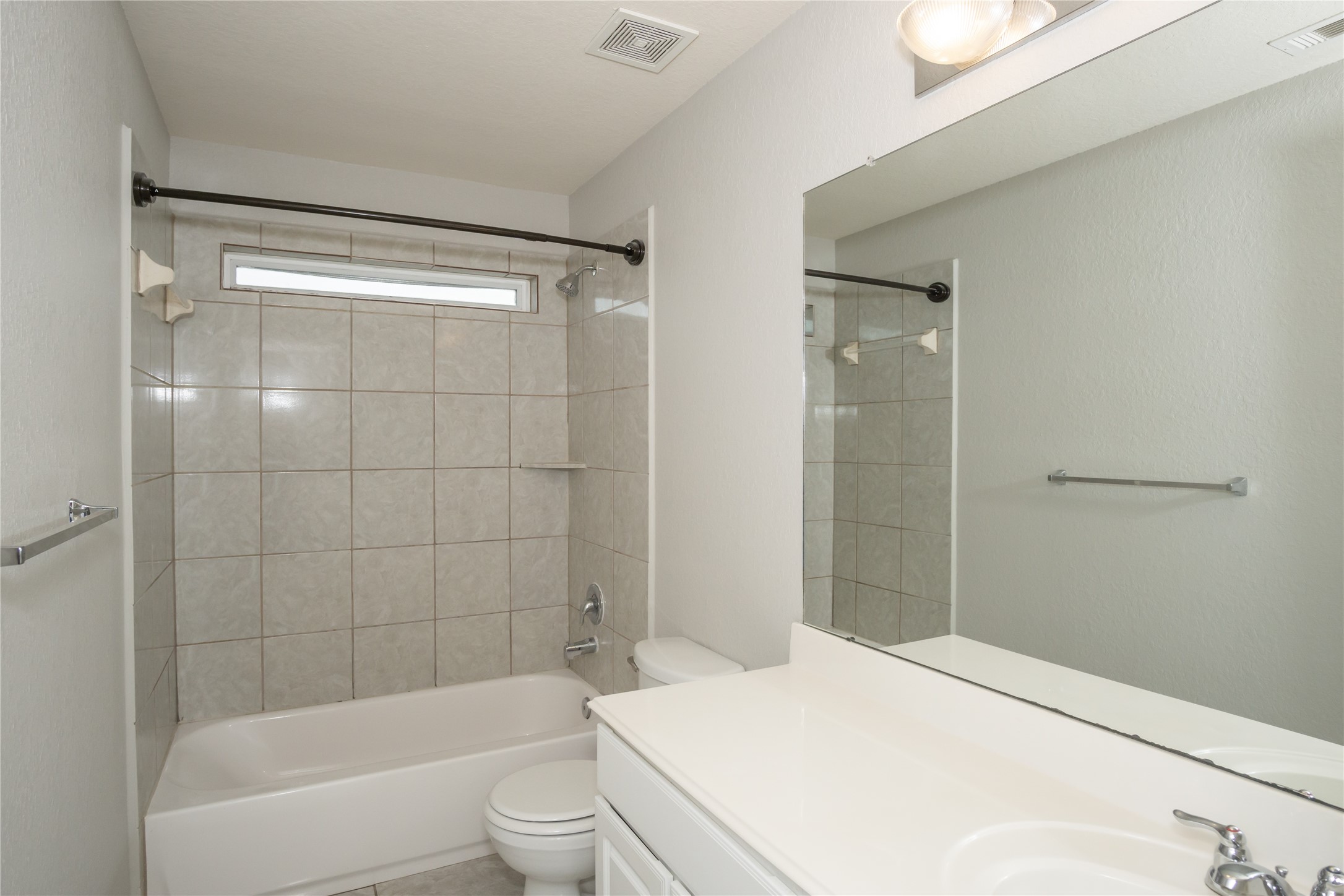 2535 Elm Crossing Trail Spring, TX 77386 - Photo 26 of 33 a bathroom with a bathtub toilet and shower