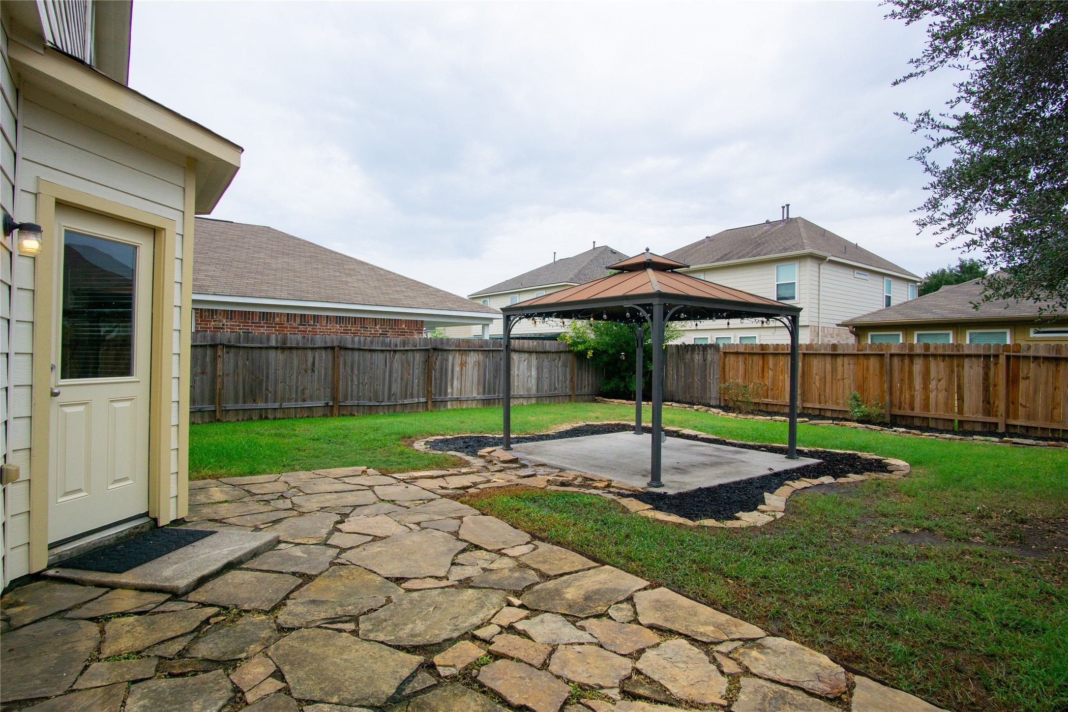 2535 Elm Crossing Trail Spring, TX 77386 - Photo 27 of 33 a view of a garden with a slide