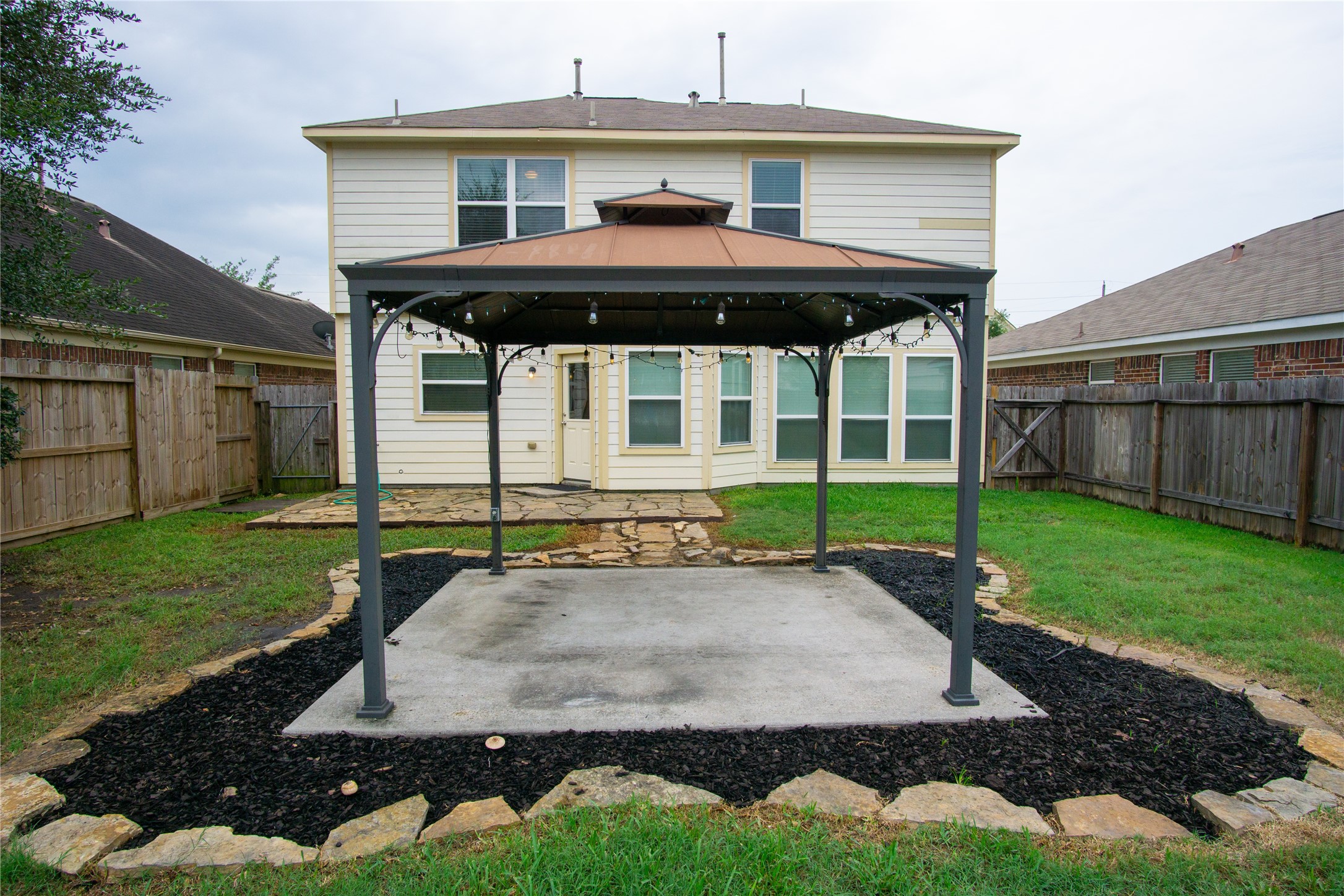2535 Elm Crossing Trail Spring, TX 77386 - Photo 29 of 33 a view of a house with backyard and porch
