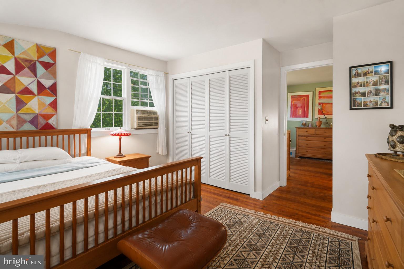 150 Cooks Glen Road Spring City, PA 19475 - Photo 28 of 37 a bedroom with a bed and wooden floor