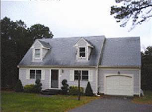 83 Wintergreen Road Mashpee, MA 02649 - Photo 1 of 18 a aerial view of a house