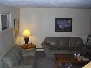 83 Wintergreen Road Mashpee, MA 02649 - Photo 6 of 18 a living room with furniture a window and a lamp